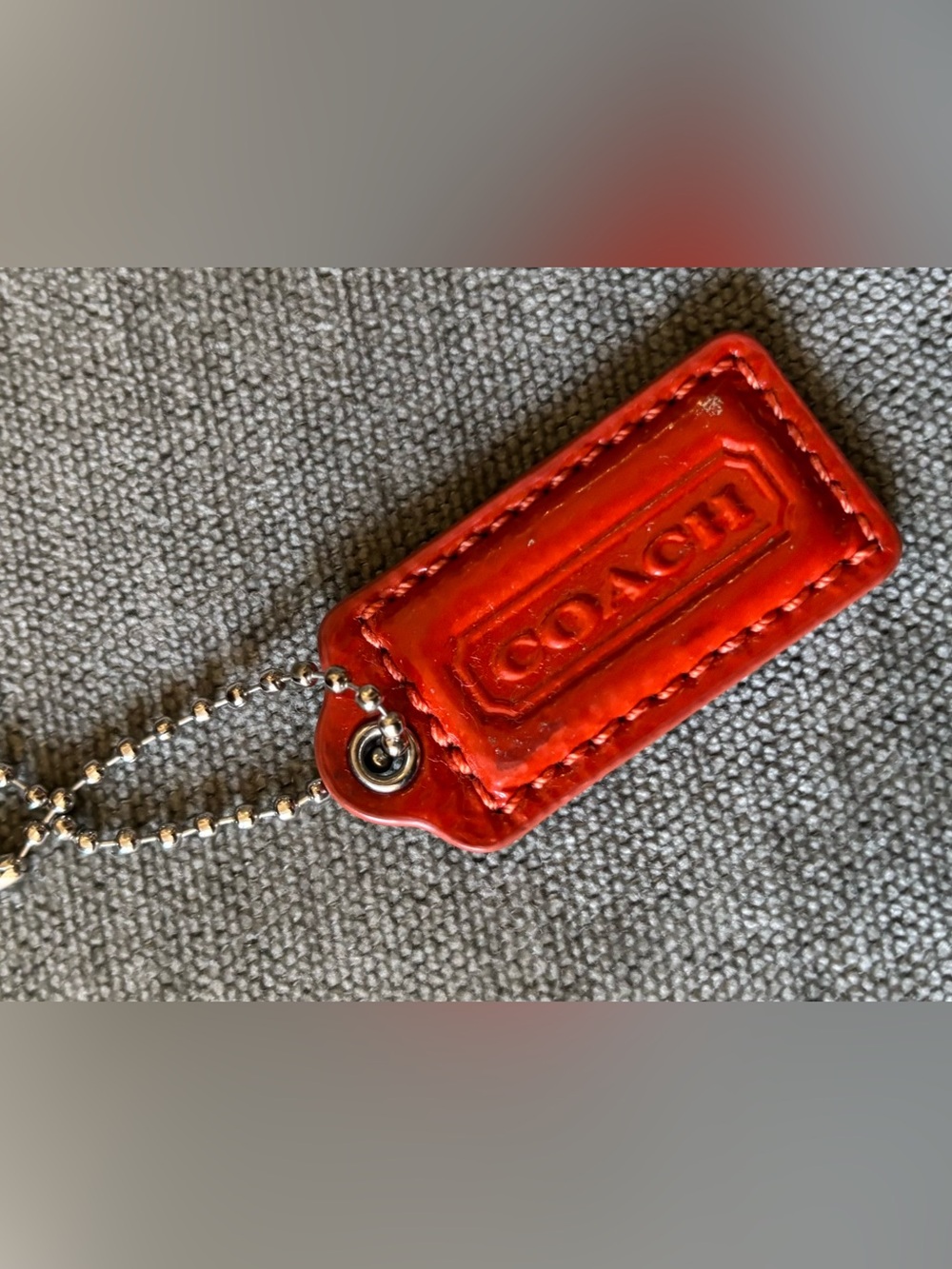 Coach orange/silver Two Toned Hangtag